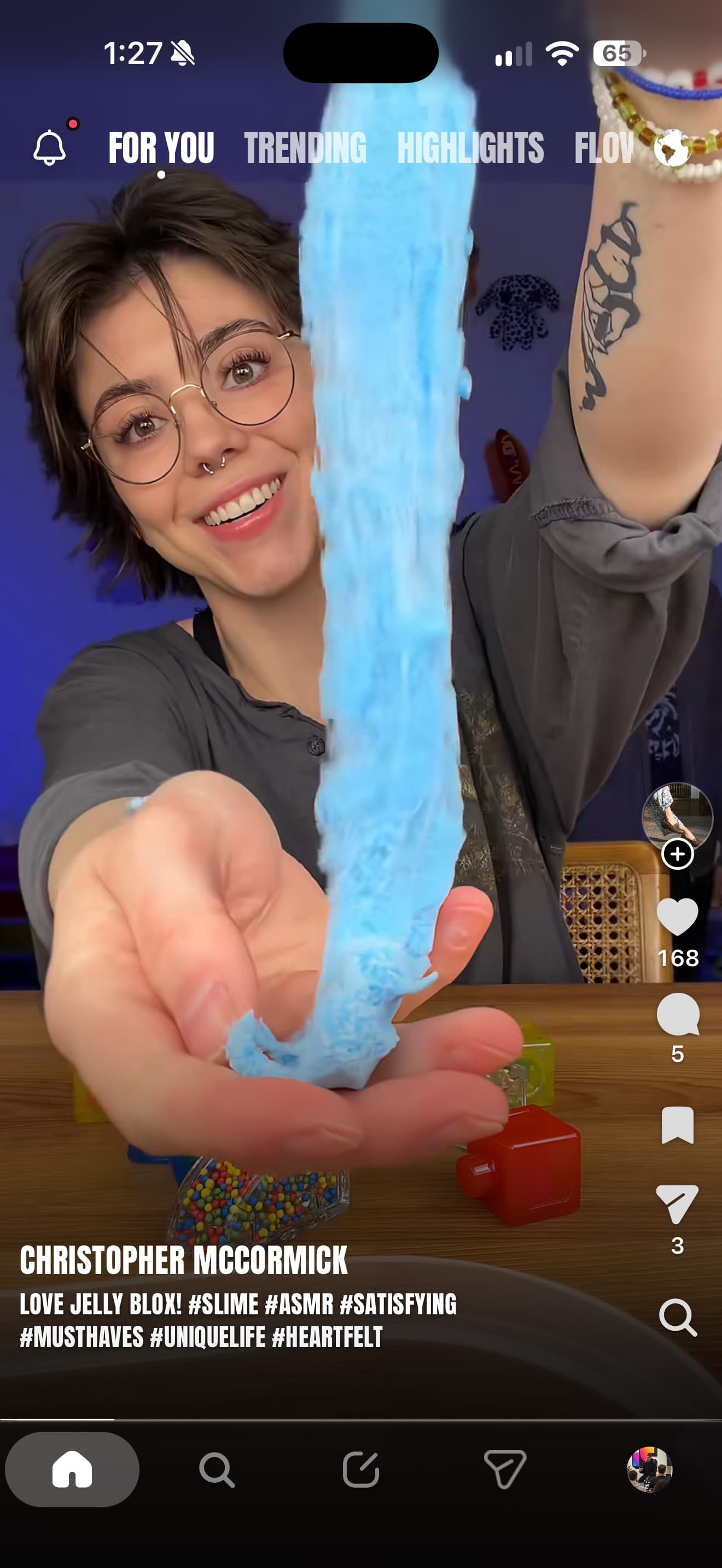 A creator video playing in the For You feed of the Whistlr app on iPhone
